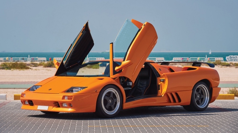 Fond d'écran HD Lamborghini Diablo orange voiture sport Roadster porte papillon image picture wallpaper